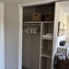 Photo 2: Large closet with hangers and baskets