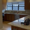 Photo 2: Large kitchen with breakfast bar