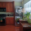 Photo 3: Kitchen with laundry room