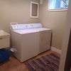 Photo 6: Shared laundry in basement