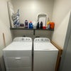 Photo 4: Full dryer and washer with storage space