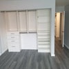 Photo 2: Closet with Built-In Shelf System