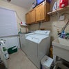 Photo 6: First floor laundry room w/ full size units