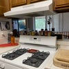 Photo 4: Fully Stocked Kitchen (First Floor)