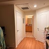 Photo 3: Walk in closet on the left, exit on the right. View from bedroom into the ensuite bathroom