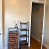 Photo 3: Bedroom - last angle - closet and two large shelf units