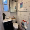 Photo 7: Bathroom - its bigger than it looks, full size bathtub, stoarge space behind the mirror.