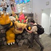Photo 4: Me squaring up to the Bowser statue in Nintendo New York