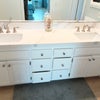 Photo 4: Bedroom 1 - Large quartz vanity with dual sinks