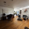 Photo 3: Baby Grand piano, fireplace, eclectic designer/antique furniture