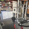 Photo 9: Washer and dryer in garage with some fitness setup too. 