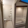 Photo 7: Bathroom features a Jacuzzi.