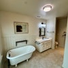Photo 2: Master bathroom with tub and shower