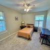 Photo 4: Guest bedroom with twin bed and desk