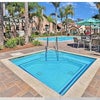 Photo 2: jacuzzi and pool for you to enjoy