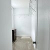 Photo 3: Walk in closet 