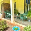 Photo 9: Front porch chill area