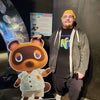 Photo 5: This is me meeting Tom Nook in real life at an Animal Crossing aquarium event!