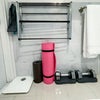 Photo 12: Small fitness area in larger bathroom, resistance bands, yoga mats, biometric scales included in eac