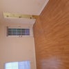 Photo 4: Door to back stoop under deck, and walk-in closet (bathroom to the right)