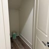 Photo 9: Spare closet under the stairs for extra storage 
