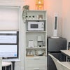 Photo 4: Microwave, cutleries, fridge, cups, plates, coffee maker 
