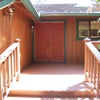 Photo 8: Front entrance to the home -deck is being repainted