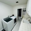 Photo 6: Another angle of laundry room