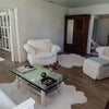 Photo 2: Cozy living room walking into TV room and kitchen. Al new flooring and fresh paint into laundry room
