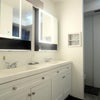 Photo 6: downstairs shared bathroom, private vanity and sink