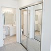 Photo 4: One of Two Huge Mirrored Sliding Closets