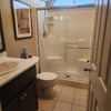 Photo 2: Shared bathroom downstairs