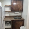 Photo 3: Kitchenette with full sized frideg 