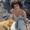 Photo 2: Petting a dog on a volcano. 
