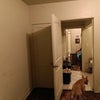 Photo 3: This is the closet on the left and the door into the restroom.