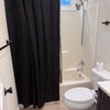 Photo 7: Shower and toilet in private bathroom