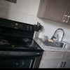 Photo 2: Modern shared kitchen with updated appliances. I keep this area very clean and organized—perfect f