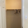 Photo 3: Closet with hangers