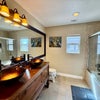 Photo 2: Bathroom 1 - Newly renovated with tub, shower and vessel sinks