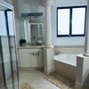 Photo 2: Private master bathroom 