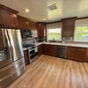 Photo 5: Remodeled kitchen with all new appliances