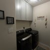 Photo 4: Fully equipped laundry room