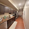 Photo 2: This is the Kitchen. It comes with all the appliances you could need (no need to worry about plates,