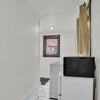 Photo 7: In - Unit Laundry Room - Microwave