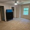 Photo 4: The black cabinet is no longer in the room. It is in the living room. BR is unfurnished.