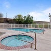 Photo 9: Pool and spa outside of clubhouse