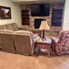 Photo 6: Private living room with a gas fireplace, large screen television and built-ins.