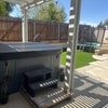 Photo 8: Hot Tub and jumper im Backyard