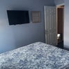 Photo 6: 32’ smart Tv, queen size bed with comforter and extra sheets
