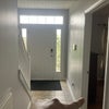 Photo 2: View of bedroom entry to the right, front door behind, and garage with parking space is behind!